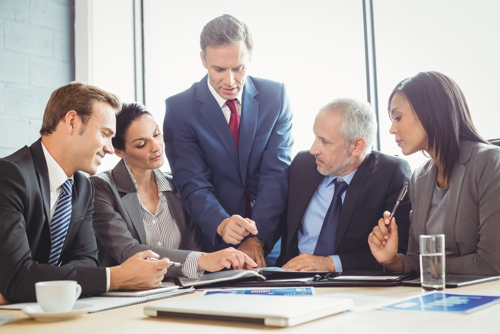 Business people discussing business during conference