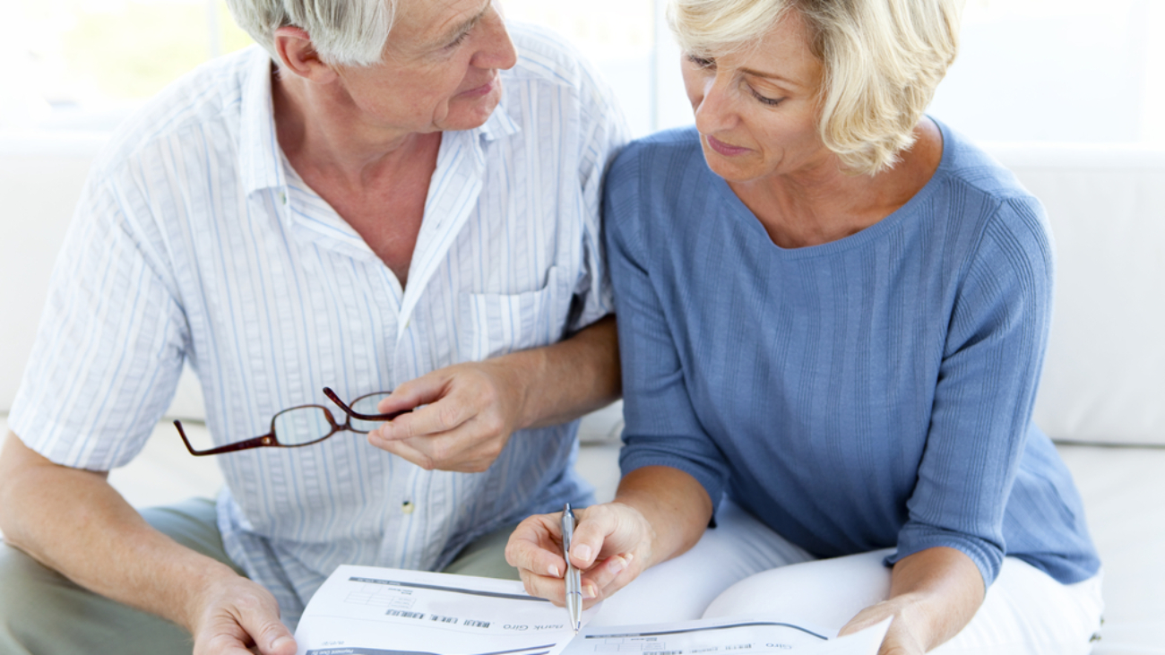 Retiring couple discussing retirement plans